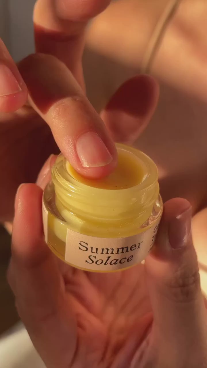 Applying the nourishing Cacao Rose Cuticle, Lip, and Brow Balm - Regenerative Tallow®
